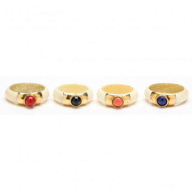 set-of-four-carved-bone-and-semi-precious-cabochon-rings