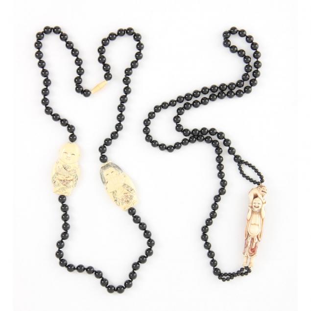 two-onyx-bead-and-figural-necklaces