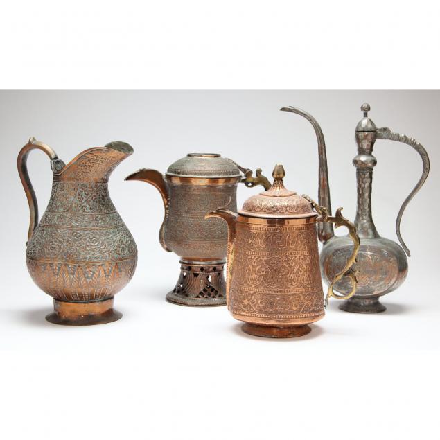 four-persian-copper-pitchers-and-ewers