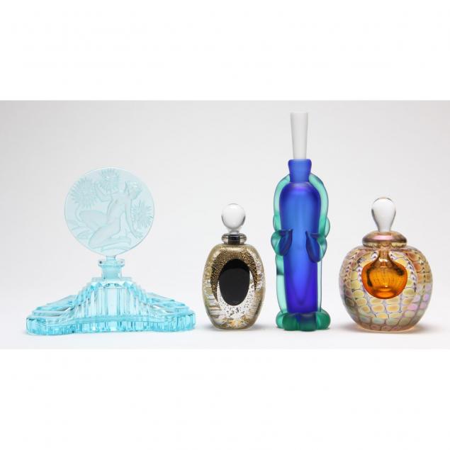 four-glass-perfume-bottles