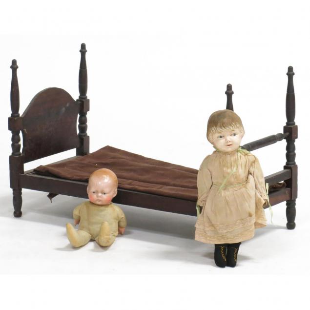 two-vintage-dolls-and-bed