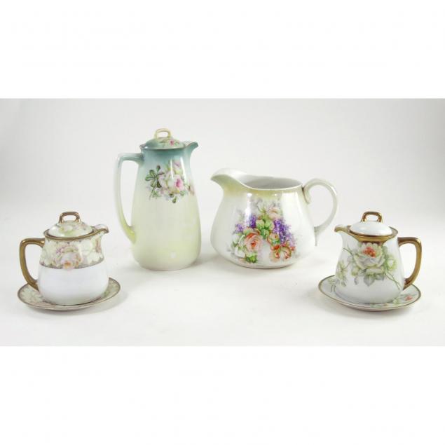 four-porcelain-pitchers