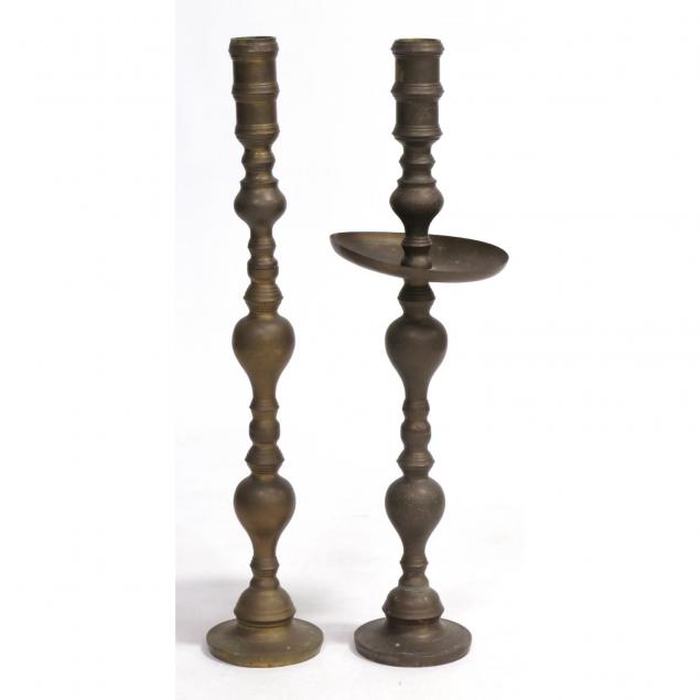 two-south-east-asian-tall-brass-candlesticks