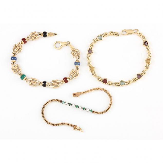 three-gold-and-gem-set-bracelets