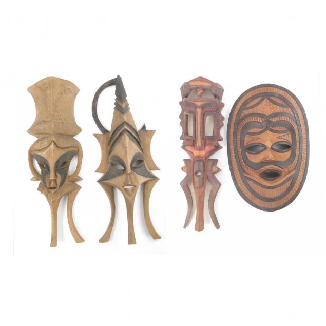four-carved-tribal-masks