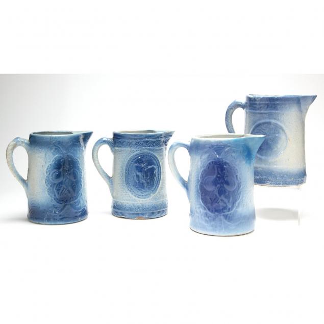 four-american-stoneware-pitchers