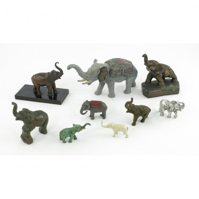 nine-vintage-metal-elephant-figures