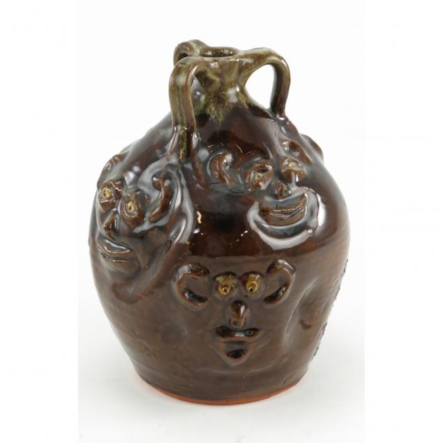 brown-s-pottery-just-another-face-in-the-crowd-jug