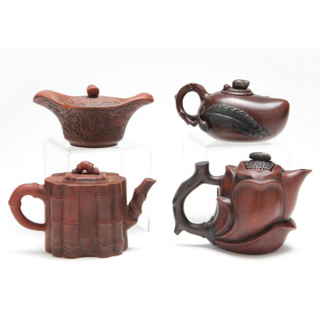group-of-four-antique-yixing-teapots