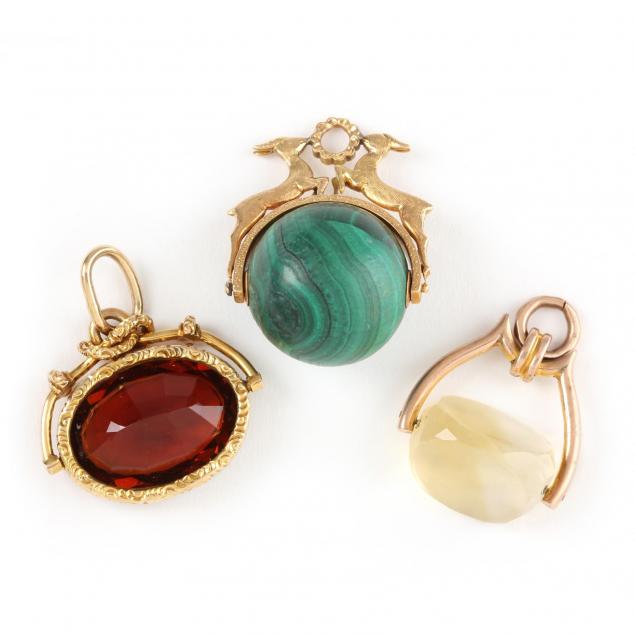three-gold-and-gem-fobs