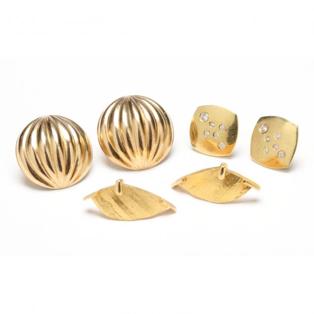 three-pairs-of-gold-earrings