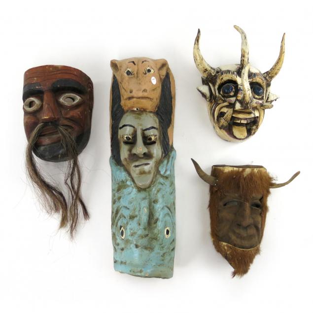 four-tribal-carved-wood-masks