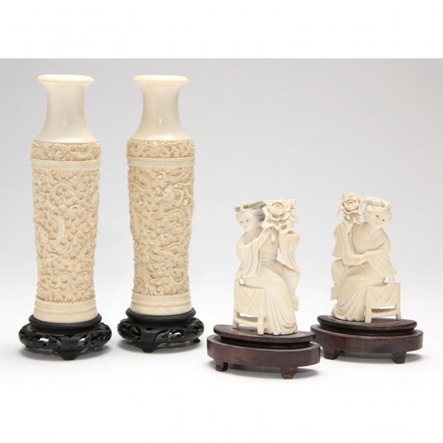 chinese-ivory-vasiform-candlesticks-and-a-pair-of-seated-maidens