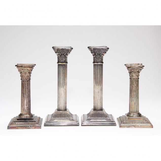 two-similar-pairs-of-antique-silverplate-candlesticks