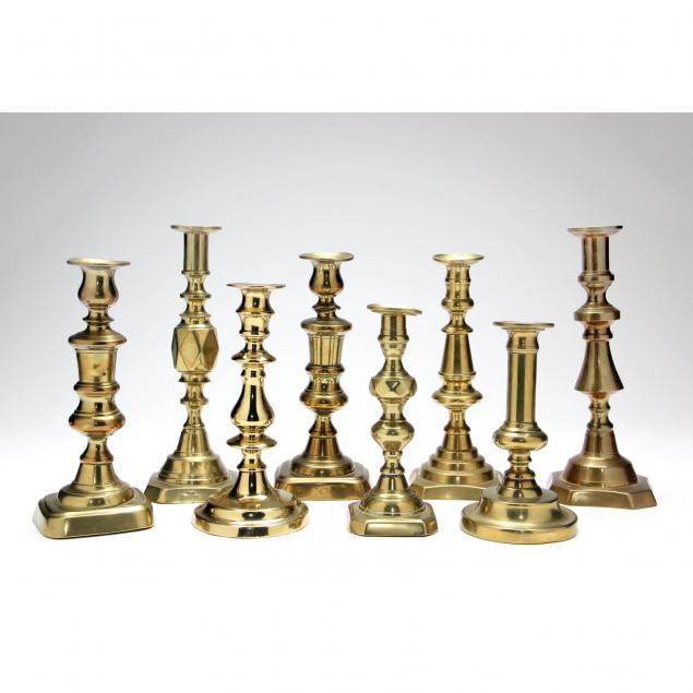 group-of-eight-antique-push-up-candlesticks