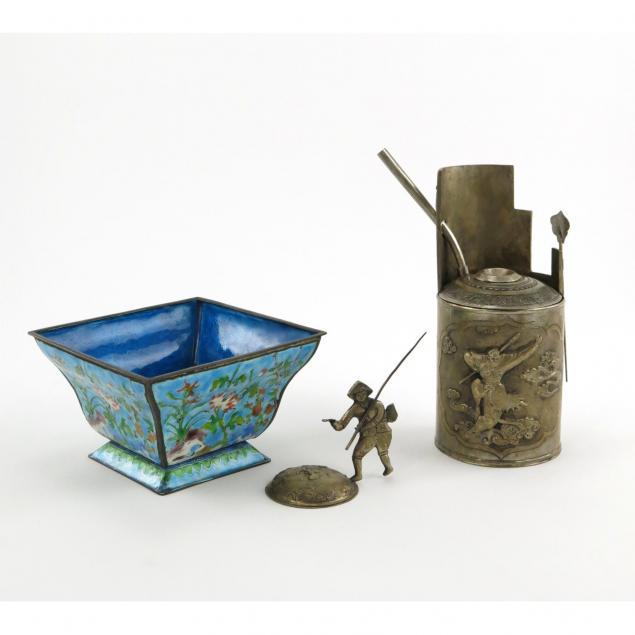 three-chinese-metal-objects