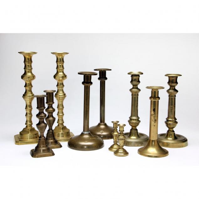 eleven-antique-brass-candlesticks