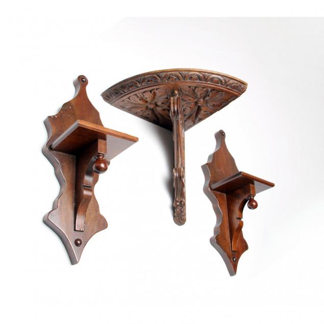 three-carved-wood-shelf-brackets
