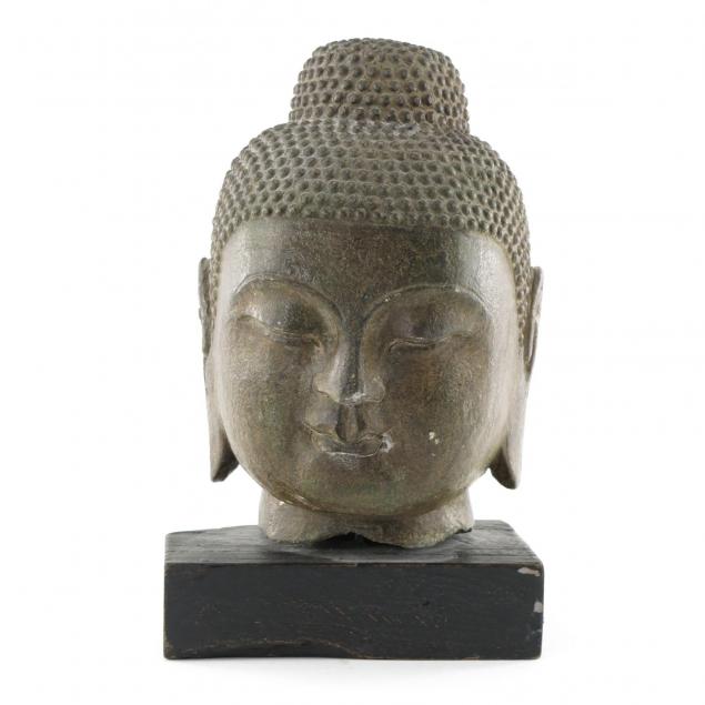 antique-carved-stone-head-of-buddha