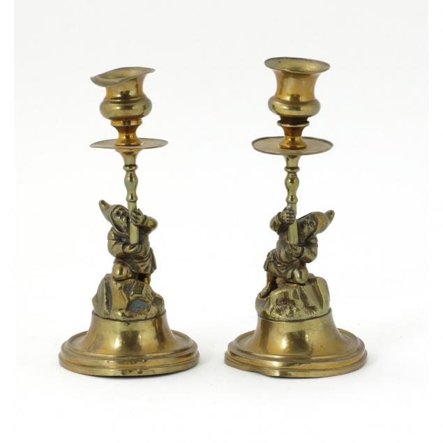 pair-of-figural-brass-candlesticks