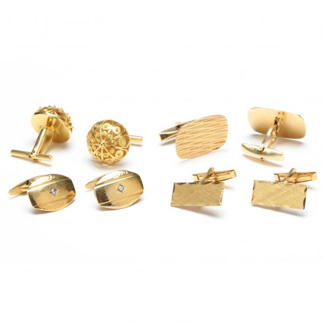 four-pairs-of-gold-cufflinks