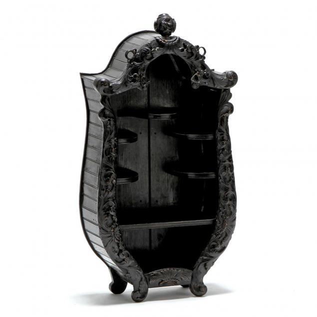 continental-carved-and-ebonized-diminutive-curio-cabinet