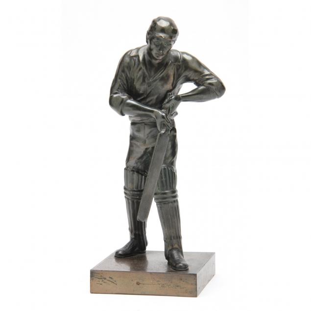 vintage-bronze-tone-sculpture-of-a-cricket-player