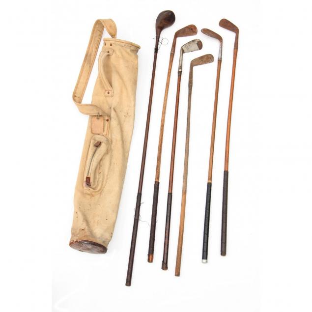 six-antique-wood-handled-golf-clubs-and-bag