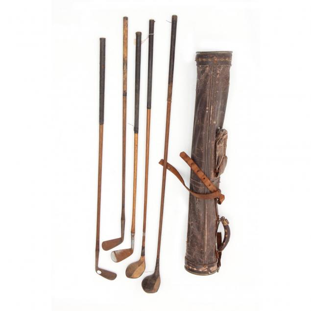 five-antique-wood-handled-golf-clubs-and-bag