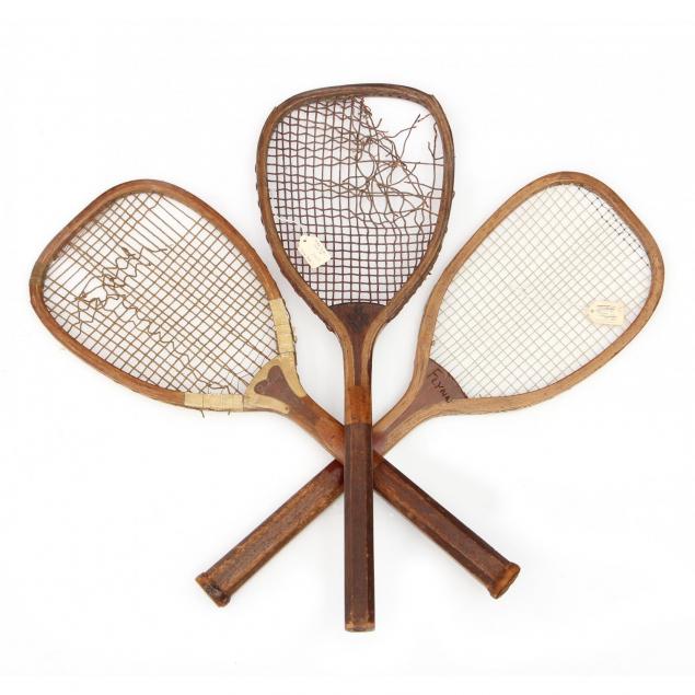 three-antique-flat-top-tennis-rackets
