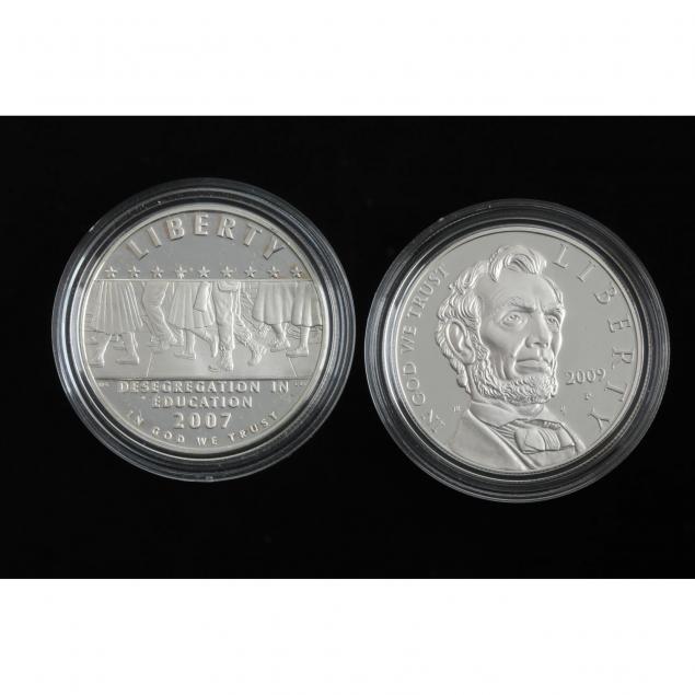 two-commemorative-90-proof-silver-dollars