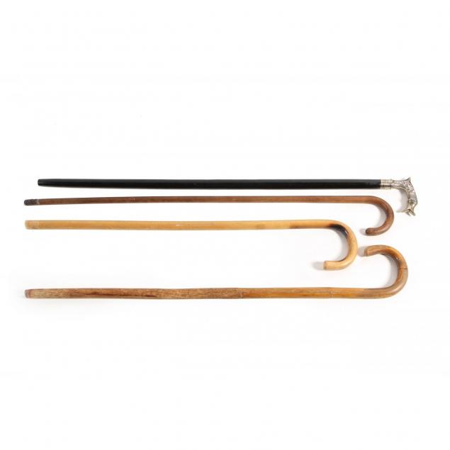three-wooden-canes-and-a-walking-stick