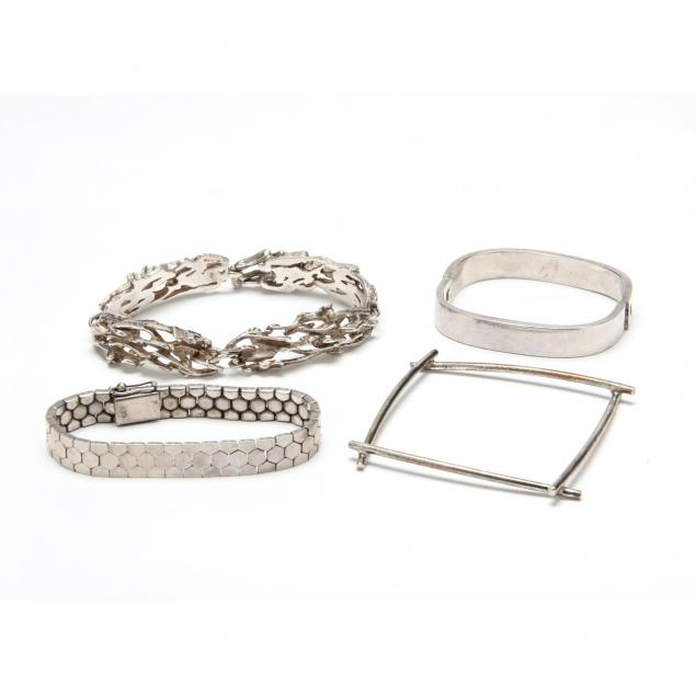 four-silver-bracelets