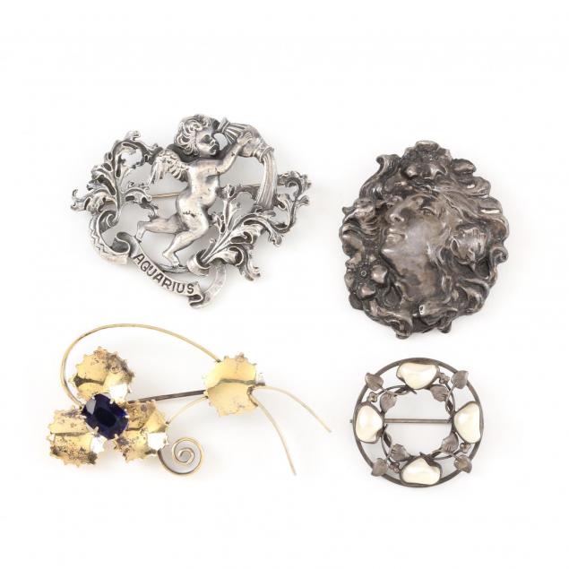 four-vintage-silver-brooches