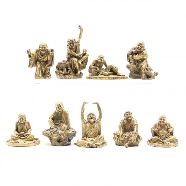 nine-small-brass-asian-statues