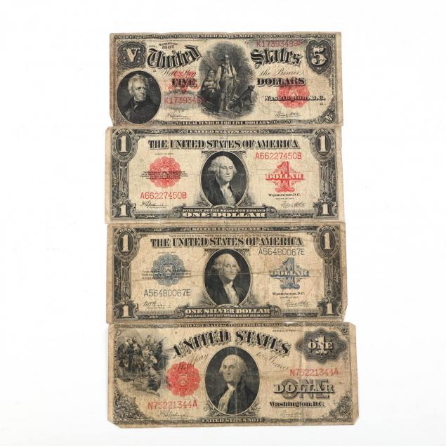 four-different-pieces-of-large-size-currency