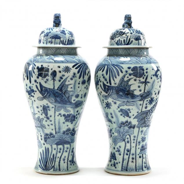 pair-of-large-palace-blue-and-white-covered-urns