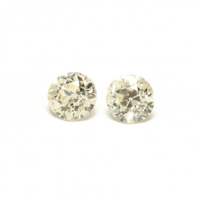 two-unmounted-round-brilliant-cut-diamonds