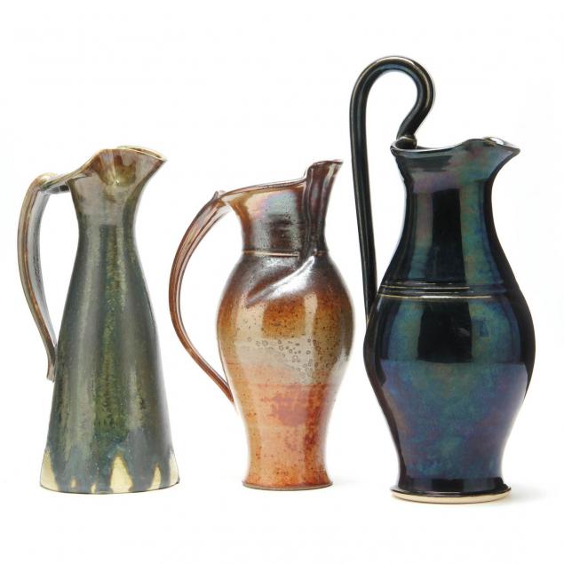 three-nc-art-pottery-pitchers