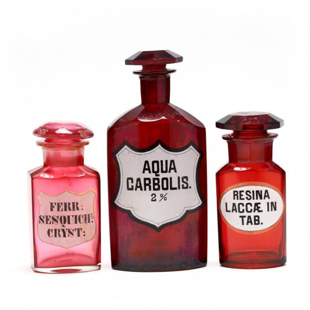 three-ruby-red-glass-apothecary-bottles