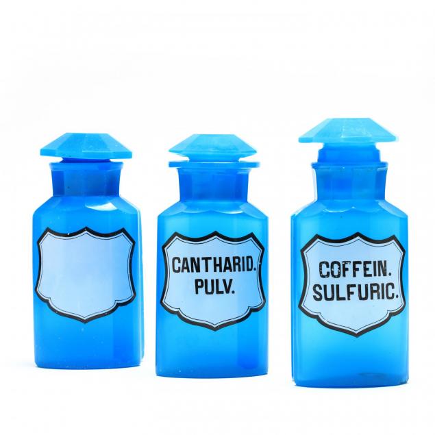 three-opaque-turquoise-apothecary-bottles