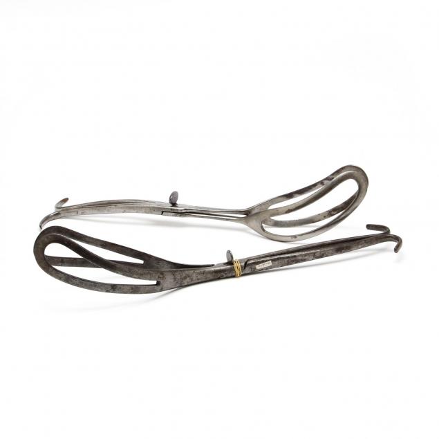 two-pairs-of-antique-steel-obstetric-forceps