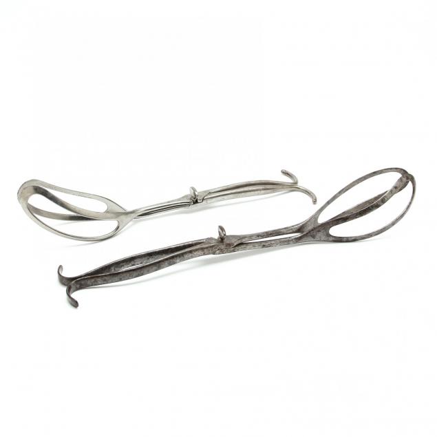 two-pairs-of-antique-steel-obstetrical-forceps