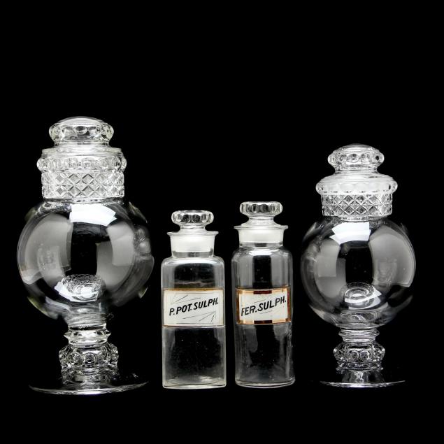 four-antique-glass-apothecary-jars