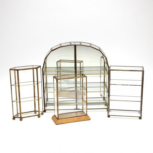 four-brass-and-glass-display-cases
