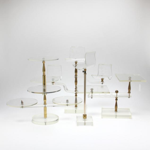 four-lucite-and-brass-department-store-displays