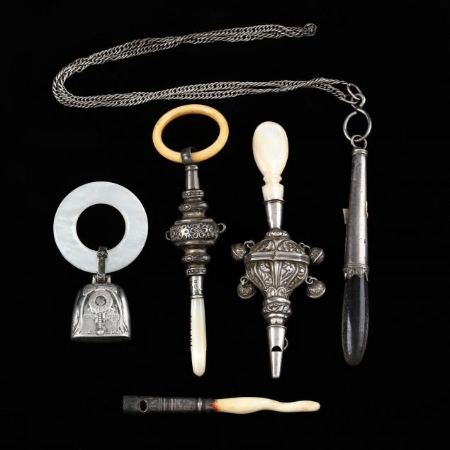 five-antique-silver-rattles-with-natural-material-teethers