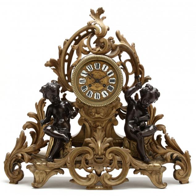 french-patinated-and-gilt-bronze-figural-mantel-clock