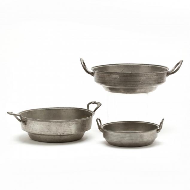 three-antique-graduated-pewter-serving-bowls