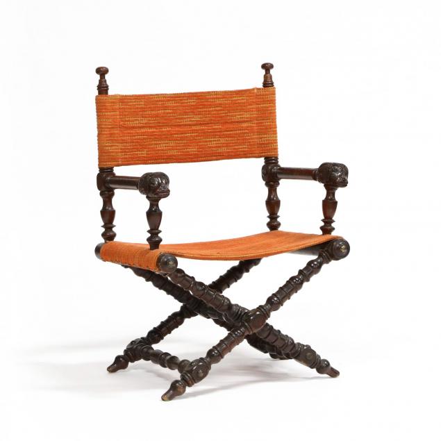 an-antique-campaign-chair